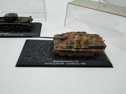 Set of 3 military tank models in display...