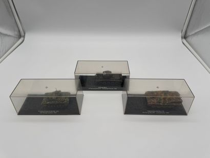 Set of 3 military tank models in display...