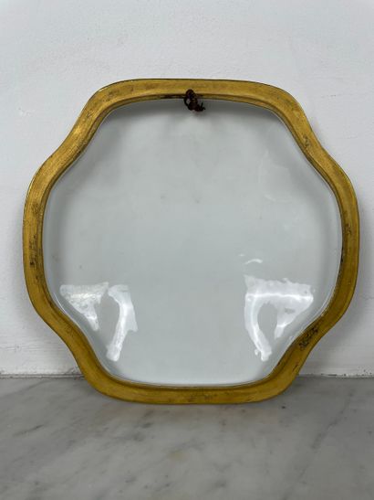 Domed porcelain wall plaque decorated with...