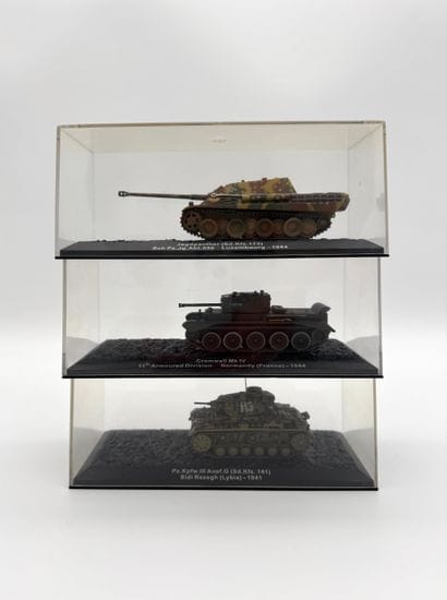 Set of 3 military tank models in display...