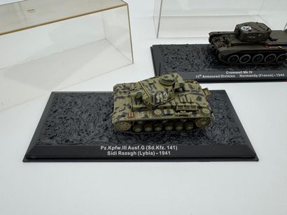 Set of 3 military tank models in display...
