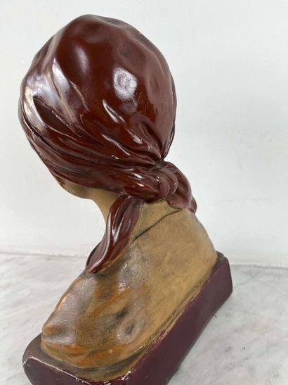 Female bust in painted terra cotta, representing...