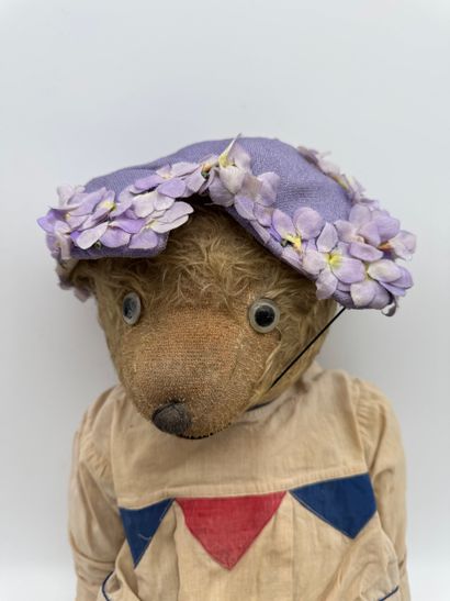 Teddy bear with dress and hat
Teddy bear...