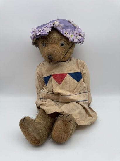 Teddy bear with dress and hat
Teddy bear...