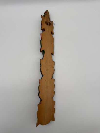 Carved wood wall totem with mask decoration
Carved...