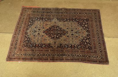 Medallion-decorated wool rug in the style...