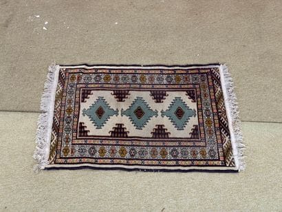 Wool rug with geometric decoration, in the...