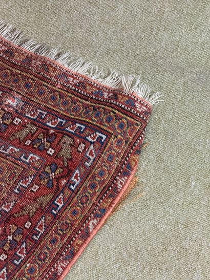 Wool rug with striped geometric decoration,...
