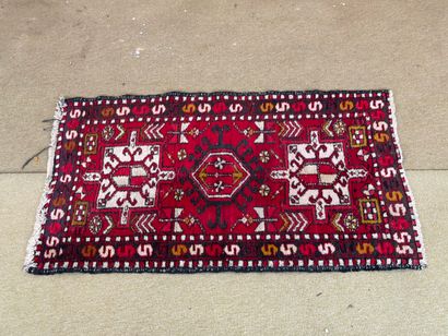 Geometrically decorated wool carpet, Oriental...