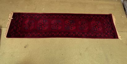 Bokhara-type corridor rug with geometric...