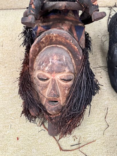 Two ethnographic masks - Africa (attributed...