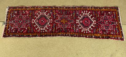 Geometrically decorated wool carpet, Gharajeh...