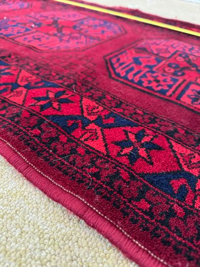 Bokhara-type corridor rug with geometric...