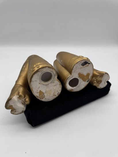 Pair of bookends featuring feminine legs...