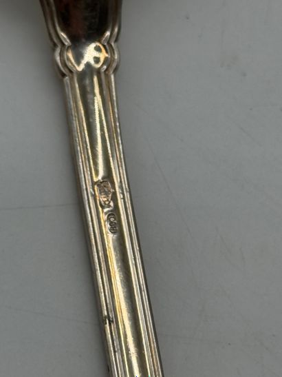 Set of 17 silver serving pieces.
Set comprising...