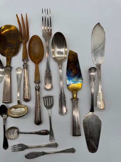 Set of 17 silver serving pieces.
Set comprising...