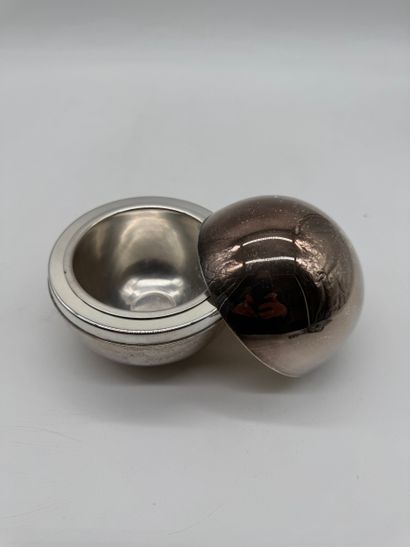 Set of two modernist silver tableware items
Silver...