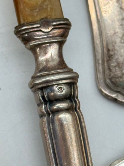 Set of 17 silver serving pieces.
Set comprising...
