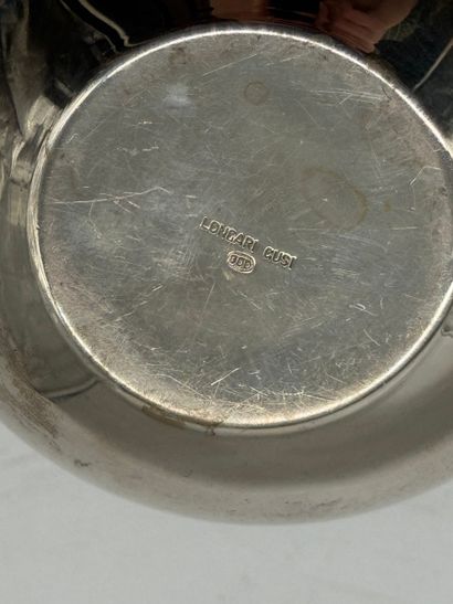 Set of two modernist silver tableware items
Silver...