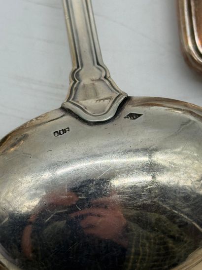 Set of 17 silver serving pieces.
Set comprising...