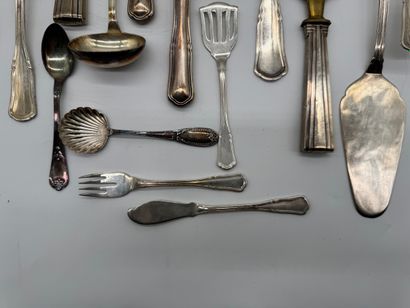 Set of 17 silver serving pieces.
Set comprising...