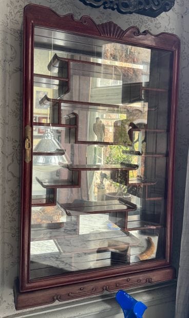 Vitrine murale asiatique en bois
Meuble vitrine...