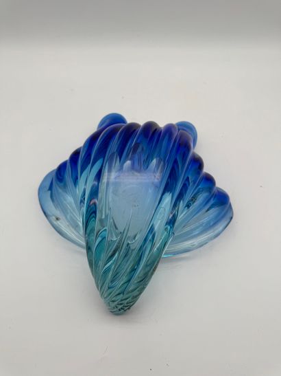 Blue glass basket in the shape of a shell...