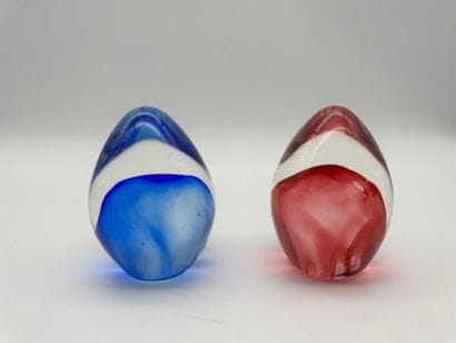 Set of two glass paperweights - egg shape,...