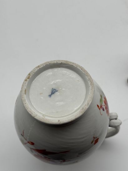 Porcelain tea set with floral design
Porcelain...