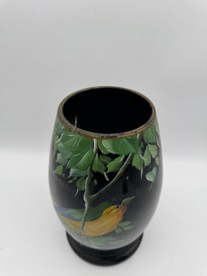 Hand-painted bird vase
Vase in composite...
