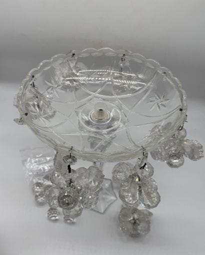 Glass stemmed bowl decorated with grape clusters
Pressed...