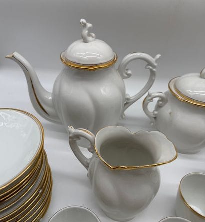 White porcelain coffee/tea set with gold...