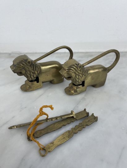 Pair of bronze lion-shaped padlocks with...
