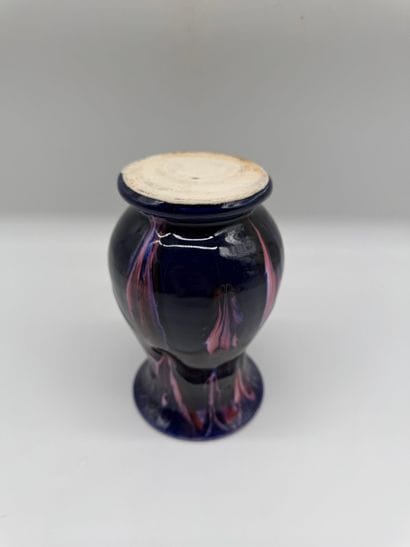 Glazed ceramic vase with flowing decoration
Baluster-shaped...
