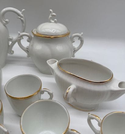 White porcelain coffee/tea set with gold...