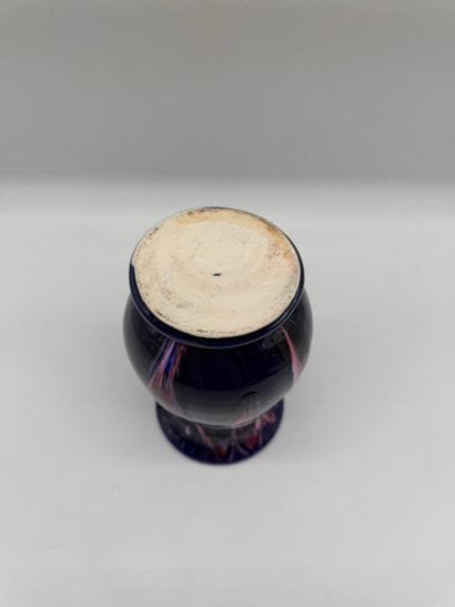 Glazed ceramic vase with flowing decoration
Baluster-shaped...
