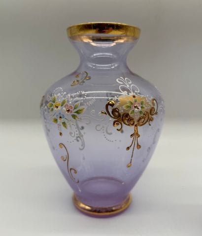 Two violet-colored glass vases decorated...