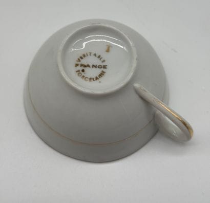 Glazed porcelain tea/coffee set with gold...
