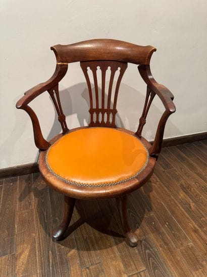 Swivel office chair with openwork backrest,...