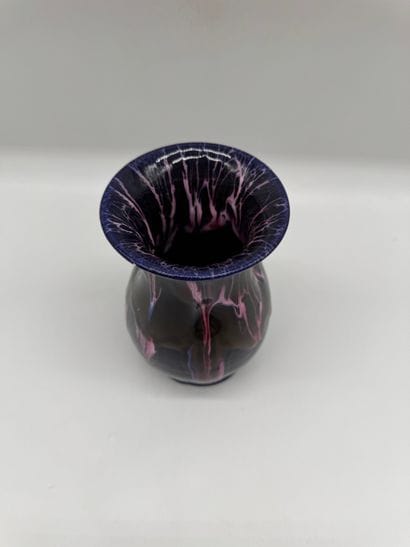 Glazed ceramic vase with flowing decoration
Baluster-shaped...