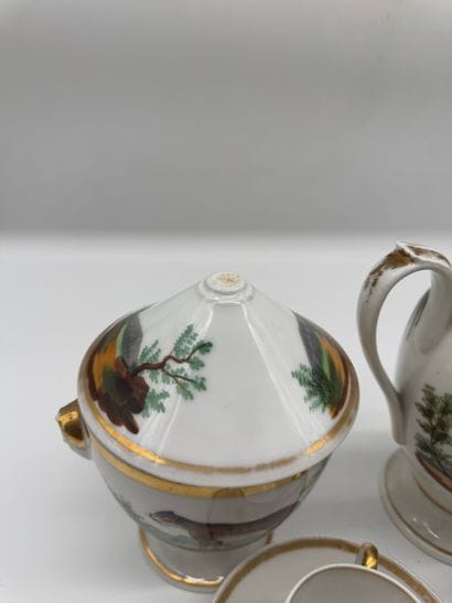 NEO-EMPIRE STYLE 20TH CENTURY
A white porcelain...