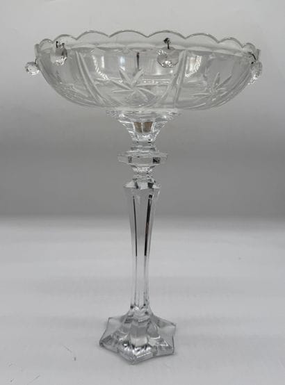 Glass stemmed bowl decorated with grape clusters
Pressed...