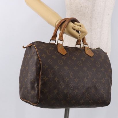 LOUIS VUITTON “Speedy” bag in brown Monogram...