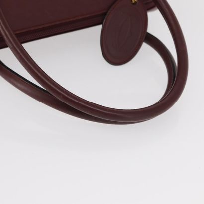 CARTIER Sac « Must Line » en cuir bordeaux,...