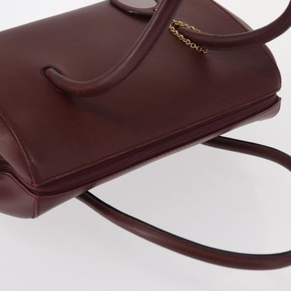 CARTIER Sac « Must Line » en cuir bordeaux,...