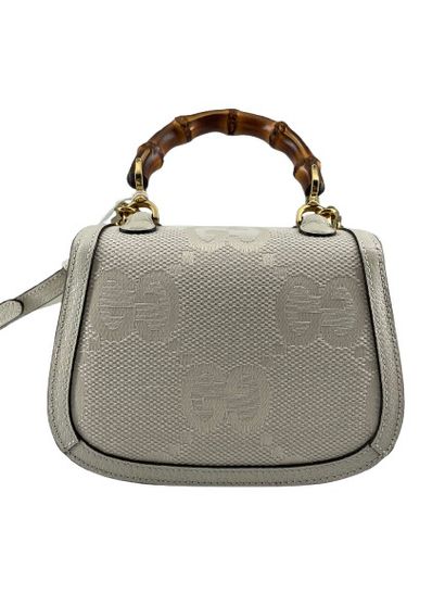 GUCCI “Vintage Convertible Bamboo Top Handle”...