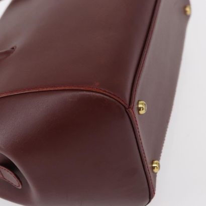 CARTIER Sac « Must Line » en cuir bordeaux,...