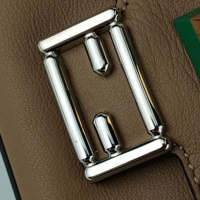 FENDI “Chain Baguette Charm” bag in beige...