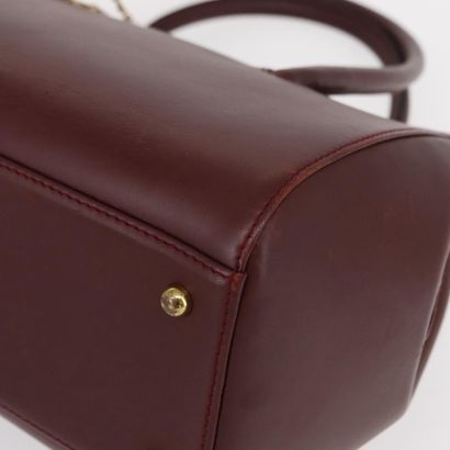 CARTIER Sac « Must Line » en cuir bordeaux,...