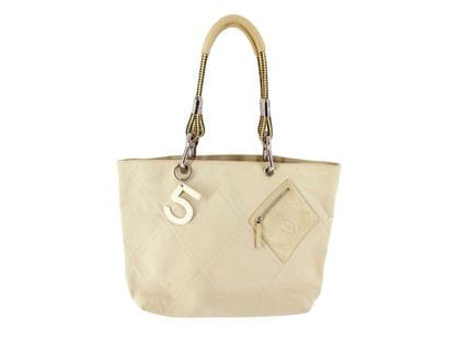 CHANEL Sac « Shopper Tote » en toile brune.
Dimensions...